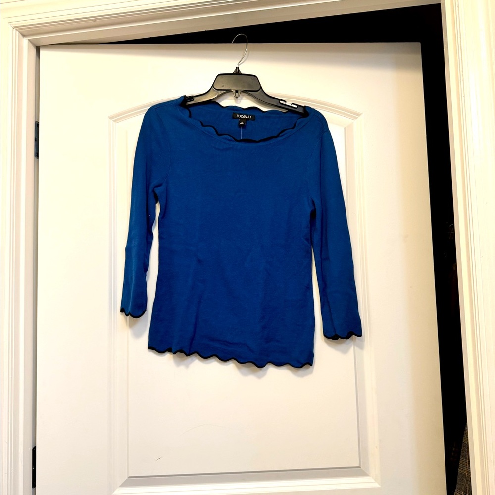 New scalloped neckline and sleeve sweater